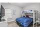 Cozy bedroom featuring a bunk bed with a playful blue patterned cover, perfect for or guests at 1115 Martin Luther King Jr Sw Dr, Atlanta, GA 30314