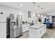 Contemporary kitchen boasting stainless steel appliances, granite countertops, a center island, and an open layout at 1115 Martin Luther King Jr Sw Dr, Atlanta, GA 30314