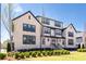 Beautiful multi-level brick home featuring manicured landscaping and black trim at 3905 Danube Ln # 215, Atlanta, GA 30339