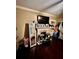 Bedroom featuring a decorative fireplace and mantel with dark, hardwood floors at 698 Ira St, Atlanta, GA 30310