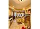 Spacious kitchen with light-colored cabinets, tile floors, and stainless steel appliances at 698 Ira St, Atlanta, GA 30310