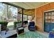 Relaxing covered patio with outdoor seating, great for entertaining or enjoying the outdoors at 865 Mount Katahdin Trl, Johns Creek, GA 30022