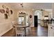 Dining room with hardwood floors and a view into the kitchen at 865 Mount Katahdin Trl, Johns Creek, GA 30022