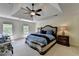 Spacious main bedroom with a trey ceiling, ceiling fan, and large windows at 865 Mount Katahdin Trl, Johns Creek, GA 30022