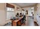 Bright music room featuring hardwood floors, sound equipment, and ample natural light at 865 Mount Katahdin Trl, Johns Creek, GA 30022