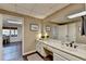 Bathroom vanity with ample countertop space, double sinks, and updated fixtures at 865 Mount Katahdin Trl, Johns Creek, GA 30022