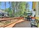 Spacious wooden deck with outdoor furniture, offering a serene outdoor living space at 865 Mount Katahdin Trl, Johns Creek, GA 30022