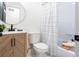 Charming bathroom featuring a vanity with modern fixtures and a bathtub with a stylish shower curtain at 2876 Wendwood Dr, Marietta, GA 30062