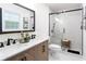 Stylish bathroom featuring a double vanity, modern fixtures, and a sleek glass-enclosed shower at 2876 Wendwood Dr, Marietta, GA 30062