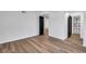 Spacious bedroom featuring wood-look floors, neutral walls, and an ensuite bathroom at 2876 Wendwood Dr, Marietta, GA 30062