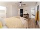 Main bedroom with modern furniture, including vanity and adjacent access to main bath at 2876 Wendwood Dr, Marietta, GA 30062