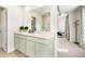 Bright bathroom features double sinks, a large mirror, and a separate shower area at 354 Friendship Oak Way, Hampton, GA 30228