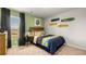 Cozy bedroom with skateboard decor and a view from the window, creating a relaxing space at 354 Friendship Oak Way, Hampton, GA 30228