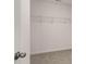 A view into the closet showcasing wire shelving for optimal storage space, door, and carpet at 354 Friendship Oak Way, Hampton, GA 30228