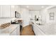 Well-equipped kitchen featuring granite countertops, stainless steel appliances, and ample cabinet space at 354 Friendship Oak Way, Hampton, GA 30228