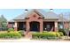 Charming brick clubhouse with manicured landscaping, offering residents a welcoming community space at 3613 Lake Estates Way, Atlanta, GA 30349