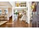 Grand foyer with high ceilings, hardwood floors, staircase and open view to multiple rooms at 3613 Lake Estates Way, Atlanta, GA 30349
