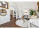 Sitting room with hardwood floors, natural light, fireplace, and neutral color palette at 3613 Lake Estates Way, Atlanta, GA 30349