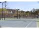 Well-maintained community tennis courts for recreational enjoyment and exercise at 3613 Lake Estates Way, Atlanta, GA 30349