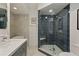 Contemporary bathroom featuring a glass shower with blue tile, a white soaking tub and stylish fixtures at 3636 Habersham Nw Rd # 2103, Atlanta, GA 30305