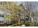 Stunning building exterior with brick facade, manicured landscaping, and convenient entryway at 3636 Habersham Nw Rd # 2103, Atlanta, GA 30305