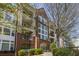 Beautiful brick condo building with balconies and lush landscaping at 3636 Habersham Nw Rd # 2103, Atlanta, GA 30305