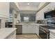 Open concept kitchen with stainless steel appliances and natural light from an exterior window at 3636 Habersham Nw Rd # 2103, Atlanta, GA 30305