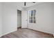 Cozy bedroom with wood floors and a closet, featuring an abundance of natural light at 6244 Marbut Farms Trl, Lithonia, GA 30058