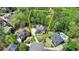 Overhead view of the property location in an established neighborhood with mature trees, landscaping, and community amenities at 955 Bishopswood Pl, Johns Creek, GA 30022