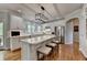 Bright, spacious kitchen with an island, stainless steel appliances, and white cabinetry at 955 Bishopswood Pl, Johns Creek, GA 30022