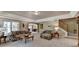 Bright living room features plush carpet, a large window, and a view of the front yard at 955 Bishopswood Pl, Johns Creek, GA 30022