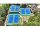 Overhead shot of the community tennis courts with multiple courts for fun and exercise at 955 Bishopswood Pl, Johns Creek, GA 30022