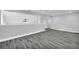 Open-concept living room featuring new flooring, neutral paint, and ample space at 175 Montego Cir, Riverdale, GA 30274