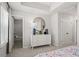 This spacious bedroom features modern furniture and a neutral color palette at 522 Provence Gate Ln, Lawrenceville, GA 30044