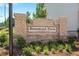 Stone entrance sign for Rosewood Farm by Taylor Morrison, est. 2023 at 522 Provence Gate Ln, Lawrenceville, GA 30044