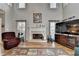 Spacious living room with high ceilings, fireplace, and plenty of natural light at 5717 Harmony Point Dr, Lilburn, GA 30047