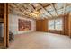 Unfinished basement offering potential for customization, natural light, and wood frame at 6389 Shadow Sq, Lithonia, GA 30058