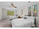 Bright bedroom with two beds, large windows, and natural light at 1890 Spalding Dr, Atlanta, GA 30350