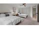 Neutral bedroom with two beds, carpet flooring and bright, natural light at 1890 Spalding Dr, Atlanta, GA 30350
