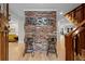 Inviting foyer featuring a brick wall with the words 'Music City' and hardwood flooring at 1890 Spalding Dr, Atlanta, GA 30350