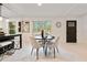Dining area featuring modern furnishings, decor, and adjacent kitchen at 244 Birch St, Atlanta, GA 30354