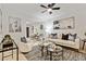 Elegant living room showcasing contemporary design, ceiling fan and chic furnishings at 244 Birch St, Atlanta, GA 30354