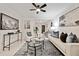 Stylish living room with modern decor, ceiling fan, and sophisticated furniture arrangement at 244 Birch St, Atlanta, GA 30354