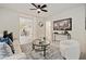 Bright living room featuring modern decor, hardwood floors, white walls, and a view into the dining room at 244 Birch St, Atlanta, GA 30354