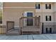 Close-up of the townhome entrance with a small porch and the unit numbers at 3938 Stillwater Dr, Duluth, GA 30096