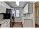 Bright kitchen with stainless steel appliances, granite counters, and subway tile backsplash at 3938 Stillwater Dr, Duluth, GA 30096