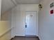 Interior stairwell leading to a door, with visible unit number signage at 3938 Stillwater Dr, Duluth, GA 30096