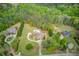 Expansive property featuring a home, pool, and lush greenery, offering privacy and space at 5040 Fawn Valley Dr, Loganville, GA 30052