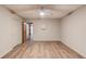 Versatile basement area with wood-look floors, offering potential for a home office, play area, or Gathering room at 5040 Fawn Valley Dr, Loganville, GA 30052