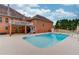 Large backyard pool, perfect for outdoor entertaining and relaxation at 5040 Fawn Valley Dr, Loganville, GA 30052